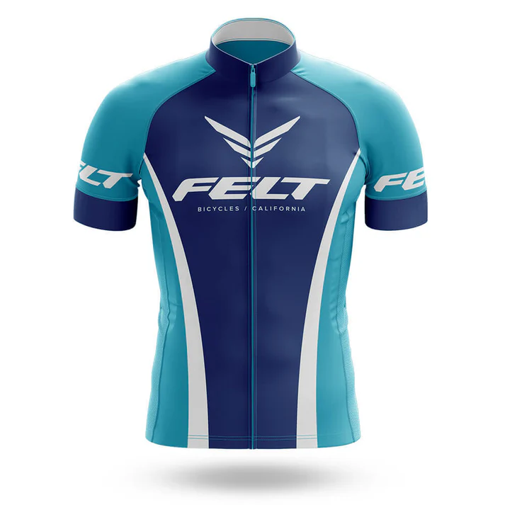 The Sugar Skull Men Short Sleeve Cycling Set features a blue and teal Chicago flag design, FELT branding and wing logos on the chest and sleeves, front zipper, white accent lines, and pairs perfectly with performance bib shorts.