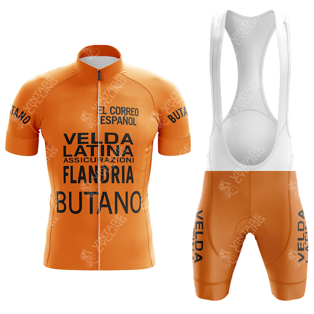 The Gatorade Chateau dAx Retro Short Sleeve Cycling Set includes an orange jersey and bib shorts adorned with black VELDA and BUTANO logos on the front, sleeves, and legs. Check the size guide for a perfect fit.