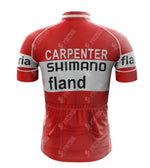 The 1972 SHIMANO Retro Short Sleeve Cycling Set has a vintage-inspired red and white jersey, featuring CARPENTER at the top on the back, with SHIMANO and fland beneath. It includes logos and patterns on sleeves and back, plus a practical visible pocket.
