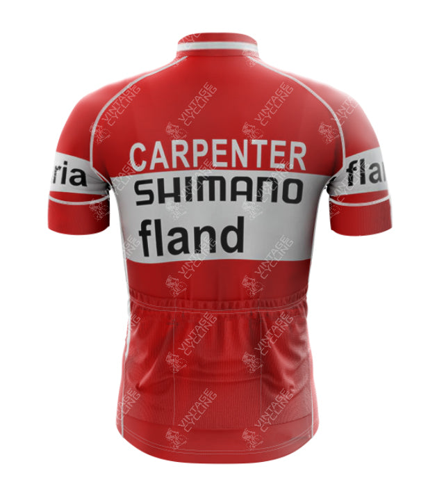 The 1972 SHIMANO Retro Short Sleeve Cycling Set has a vintage-inspired red and white jersey, featuring CARPENTER at the top on the back, with SHIMANO and fland beneath. It includes logos and patterns on sleeves and back, plus a practical visible pocket.