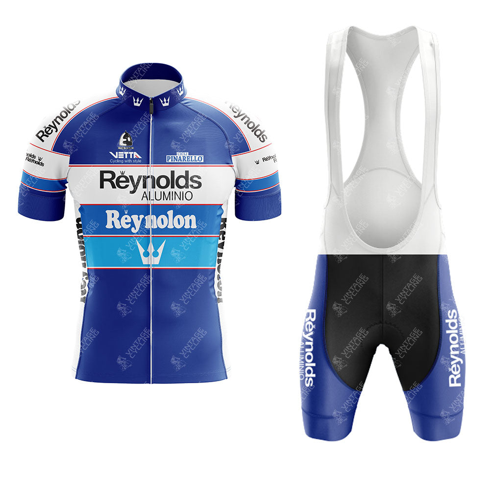 The Alfa Lum Legnano Green Retro Short Sleeve Cycling Set features classic team and sponsor logos. The set includes a zippered jersey and bib shorts with white suspenders, ideal for fans of vintage customizable cycling apparel.