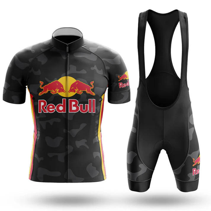 The Iggles Short Sleeve Cycling Set is a black cycling kit with a camouflage pattern, including a retro jersey and bib shorts. The short-sleeve jersey features bold Red Bull logos in red, yellow, and white on the chest and sleeves.