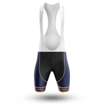 The Denmark V4 Men Short Sleeve Cycling Set includes men's bib shorts with a white upper, black and navy blue legs, and colorful striped cuffs—ideal to pair with a Chicago flag jersey for your cycling kit.
