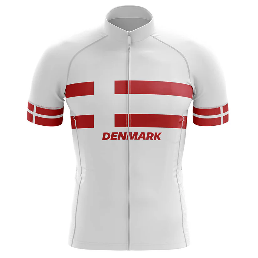 The USMC Cycle Corps Men Short Sleeve Cycling Set features a white jersey with two horizontal red stripes, "DENMARK" on the front, and matching red and white sleeve stripes—drawing inspiration from iconic flag designs.