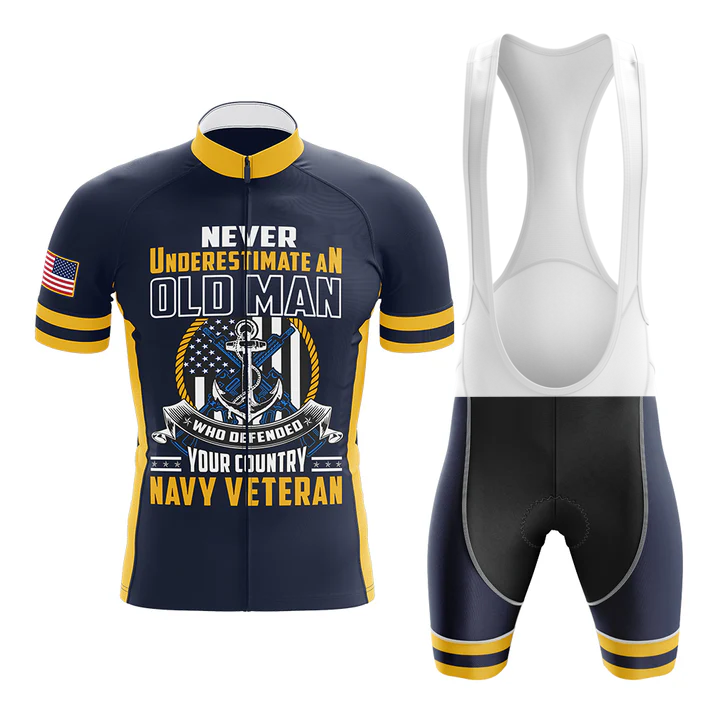 The U.S.Navy V3 Men Short Sleeve Cycling Set in navy blue and yellow features an American flag on the sleeve, “Never underestimate an old man who defended your country” graphics, plus anchor and eagle details.