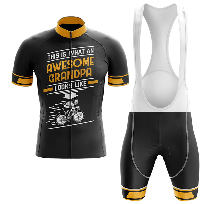 The Scotland Men Short Sleeve Cycling Set features a black and yellow jersey with "This is what an awesome grandpa looks like" above a cyclist graphic. The set includes mainly black bib shorts with white shoulder straps.