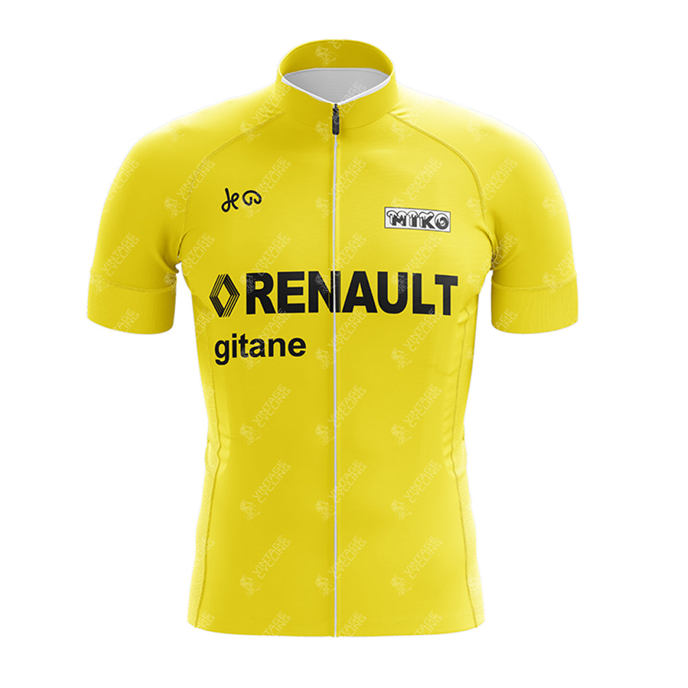 A bright yellow EPEDEX Tricatel Retro Cycling Jersey with black text and logos, including RENAULT and gitane, plus other small brand logos on the chest and sleeves. This retro jersey features a front zipper.