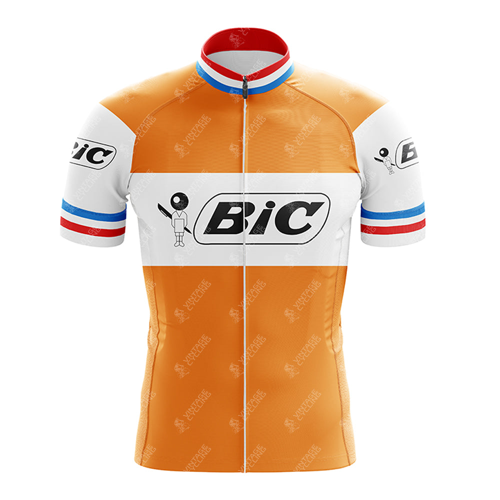 The BIC Orange Retro Short Sleeve Cycling Set pays homage to classic style with its orange and white body, red, white, and blue striped sleeves and collar, featuring the Bic logo. It includes a front zipper for convenience.