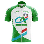 The CAFE DE COLOMBIA Retro Short Sleeve Cycling Set features a vibrant design with green and white colors, prominent Crédit Agricole and LOOK logos, a stylized CA logo in blue, green, and red, and a convenient front zipper.