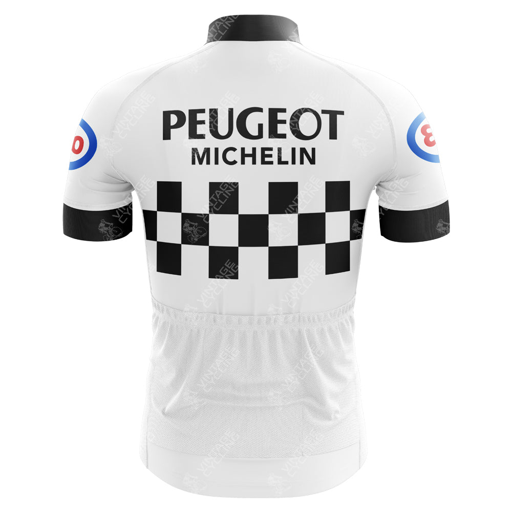 The Classic 1960s Peugeot Retro Cycling Jersey features a back view showcasing a black and white checkered pattern, PEUGEOT and MICHELIN text, red and blue circular emblem design on the sleeves, with a predominantly white body highlighted by a black collar and cuffs.