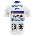 The SCIC Retro Short Sleeve Cycling Set is a white jersey accented with blue and black, featuring Paris Nice, Reynolds Retro, and 66 alongside sponsor logos like Perrier. The back displays M. Indurain with a Spanish flag.