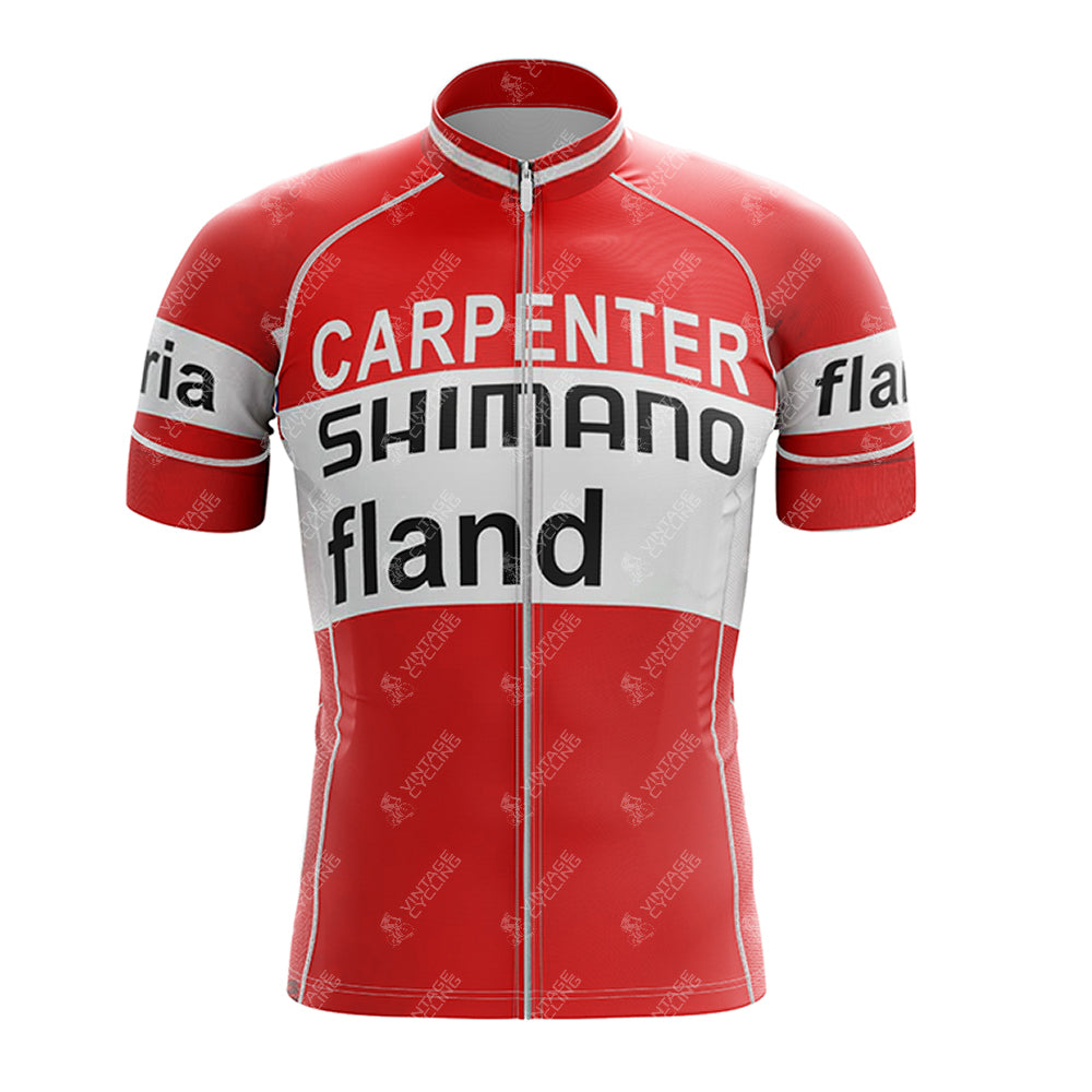 The 1972 SHIMANO Retro Short Sleeve Cycling Set features a vintage red and white design with black text, CARPENTER on the chest, 1972 SHIMANO below, Fland at the bottom, sleeves with fland on a white band, and a full front zipper for classic style.