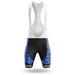 The Bees Men Short Sleeve Cycling Set includes bib shorts with a white upper, black center, and blue sides with white lightning bolts. SPECIALIZED is printed on the lower legs.