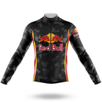 The Iggles Long Sleeve Cycling Jersey features a black camo pattern with yellow and red side stripes and the Red Bull logo in red and yellow on the chest and left sleeve, offering a bold, retro cycling look.