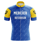 The Mercier Retro Short Sleeve Cycling Set features a blue and yellow cycling jersey with Mercier and Hutchinson on the front, short sleeves with a black and yellow circular BP logo, and a convenient front zipper.