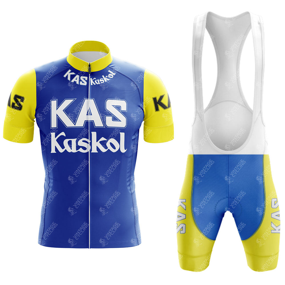 The KAS V2 Retro Short Sleeve Cycling Set includes a blue jersey with yellow sleeves, featuring KAS Kaskol in white, and matching bib shorts. Check our sizing guide for the perfect fit.