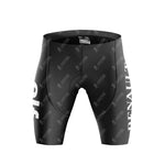 Black cycling shorts featuring the word RENAULT vertically, echoing the Renault Elf Gitane Retro Cycling Jersey Set. The fitted fabric displays seat padding and a watermark pattern, evoking the spirit of vintage Tour de France days.