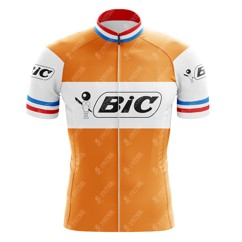 The BIC Orange-France Short Sleeve Retro Cycling Jersey features an orange and white design with a vintage Bic logo and evokes the BIC Cycling Team and Jacques Anquetil era, highlighted by blue, white, red stripes on the sleeves and collar, plus a front zipper for style and comfort.
