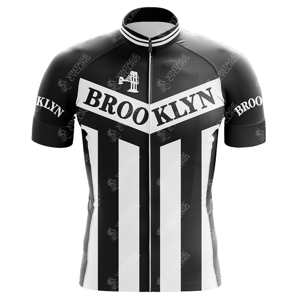 The Brooklyn Chewing Gum Retro Cycling Jersey features a black and white design with bold Brooklyn text, vertical stripes inspired by classic gum packaging, and a stylized bridge graphic reminiscent of Roger de Vlaemincks iconic era.