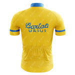 The Bartali Ursus Retro Cycling Jersey features a vibrant yellow design with blue cuffs and collar. It showcases a blue logo and Bartali URSUS text on the back, honoring Gino Bartali. Stitch detailing adds charm, and a bottom pocket offers practicality.