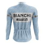 The back view of the Bianchi Blue Retro Long Sleeve Cycling Set features BIANCHI and PIRELLI logos on the back and sleeves, and includes a gel seat pad for added comfort.