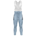 The Bianchi Blue Retro Long Sleeve Cycling Set features light blue bib tights with Bianchi in black on both legs, a white bib section with comfy straps, and a gel seat pad for enhanced riding comfort.