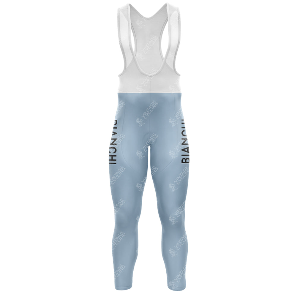 The Bianchi Blue Retro Long Sleeve Cycling Set features light blue bib tights with Bianchi in black on both legs, a white bib section with comfy straps, and a gel seat pad for enhanced riding comfort.