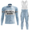 Light blue Bianchi Blue Retro Long Sleeve Cycling Set, showcasing BIANCHI and PIRELLI logos. Includes a front zipper jersey and full-length bib tights with a Gel Seat Pad, featuring black text on white panels for a classic look.