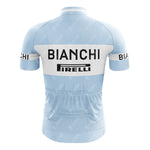 The Bianchi Blue Retro Short Sleeve Cycling Set, featuring BIANCHI and PIRELLI logos on the back and sleeves, offers a fitted design ideal for cyclists. Its short sleeves provide both comfort and style for an effortless ride.