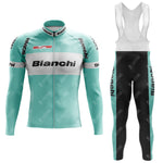 The Bianchi Grey Retro Cycling Set includes a turquoise and white long-sleeve jersey with Bianchi text and logos, paired with black bib tights. A fleece option is available for warmth on cooler rides, and the jersey features a front zipper for added functionality.