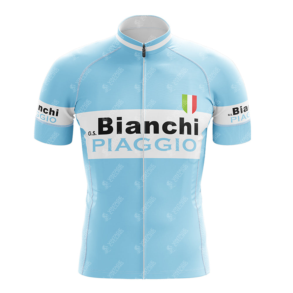 The Bianchi Piaggio Retro Short Sleeve Cycling Set features a light blue jersey with white chest and sleeve bands, adorned with Bianchi and Piaggio. It has an Italian flag emblem near the collar, a full front zipper, and exudes vintage cycling style.