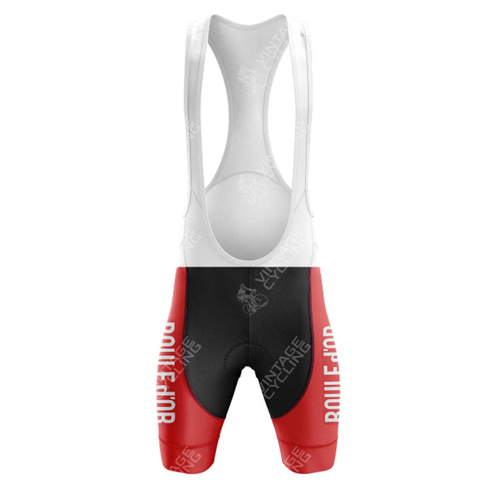The SUPER Red Retro Short Sleeve Cycling Set includes red and black bib shorts adorned with Vintage and Rouleur text, complemented by white straps. Displayed on a light background, its perfect for creating a classic cycling vibe.