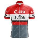 The Cilo-Aufina Retro Cycling Jersey features a red, white, and gray design with Cilo and aufina on the chest and sleeves. Made of lightweight polyester, it includes a front zipper and short sleeves for enhanced performance and comfort.