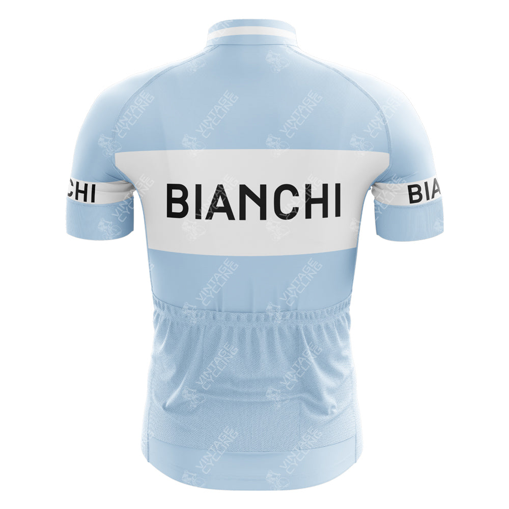 The Bianchi Retro Cycling Jersey showcases a classic baby blue and white design with BIANCHI prominently printed on the back and sleeves. This lightweight polyester jersey features short sleeves and three handy back pockets.