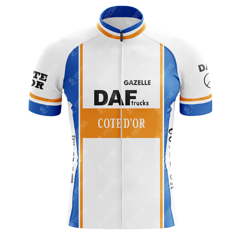 The DAF Trucks Retro Cycling Jersey features a white base with distinctive orange and blue vertical stripes. Made from lightweight polyester, it displays Gazelle, DAF Trucks, and Côte dOr logos on the front, plus extra detailing on the sleeves and sides.