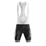 Cycling bib shorts in black and white with FAEMA on one leg, featuring shoulder straps and a mesh back for ventilation. Complements the FAEMA Black Retro Short Sleeve Cycling Set for a complete vintage look.