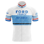 The Ford France Hutchinson Retro Cycling Jersey is lightweight polyester, featuring blue horizontal stripes with FORD FRANCE and HUTCHINSON text. It has a fitted design, zippered front, and sleeves with red, white, and blue stripes for a classic look.