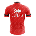 The G.S. Solo Superia Retro Cycling Jersey is a red short-sleeved sports top with black accents, G.S. Solo and SUPERIA on the back, made from lightweight polyester. It features a subtle geometric pattern inspired by classic Solo Superia jerseys.