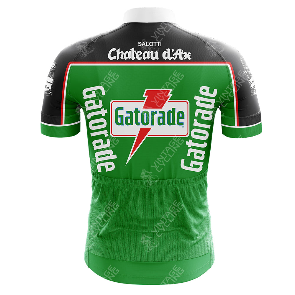 The Gatorade Retro Short Sleeve Cycling Set features a vintage-style green jersey with the iconic Gatorade logo, black shoulders, red accents, and additional Chateau dAx and Salotti logos on the upper back for a timeless look.