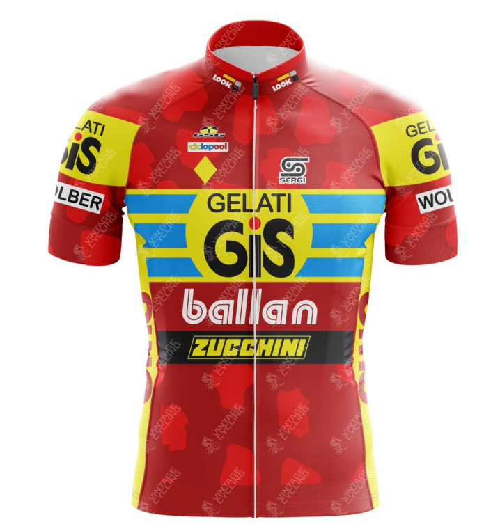 The GiS Gelati 1991 Retro Cycling Jersey showcases a vibrant red, yellow, and blue design. It features sponsor logos like diadora, Sergio, ballan, and ZUCCHINI. This classic piece has short sleeves and a full zipper, adding to its nostalgic charm.