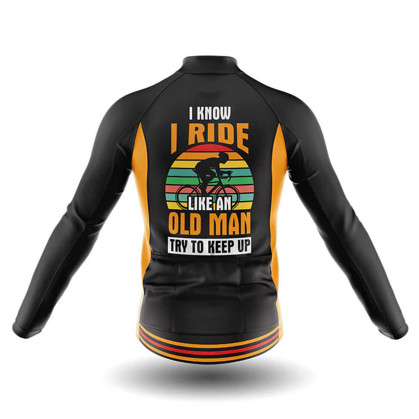 The Dawgs Long Sleeve Cycling Jersey in black and yellow features a graphic cyclist, retro-striped background, and the text: I know I ride like an old man. Try to keep up. Seen from the back for a bold performance look.