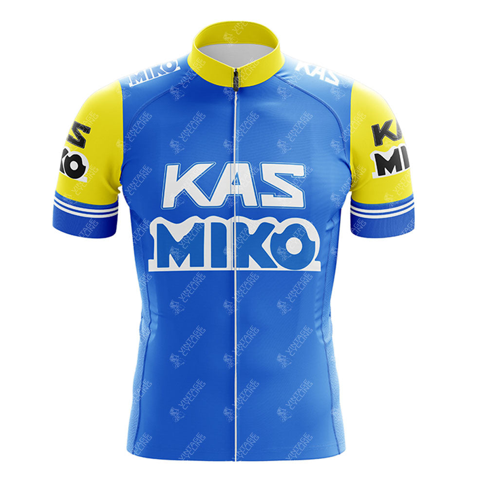 The KAS V1 Retro Short Sleeve Cycling Set features a vibrant blue and yellow jersey with a front zipper, bold white KAS MIKO text on the chest, and black-and-white branding on the sleeves, ideal for pairing with shorts.