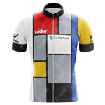 The La Vie Claire Retro Cycling Jersey Set features a Piet Mondrian-inspired geometric design with red, blue, yellow, black, and white blocks. It showcases radar and La Vie Claire logos on the chest and Wonder on the sleeves for a classic retro look.