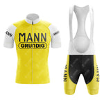 The Sem-France Loire Retro Short Sleeve Cycling Set includes a yellow and white jersey and bib shorts, featuring “MANN GRUNDIG” on the front and “MANN” displayed vertically on the left leg for classic retro style.