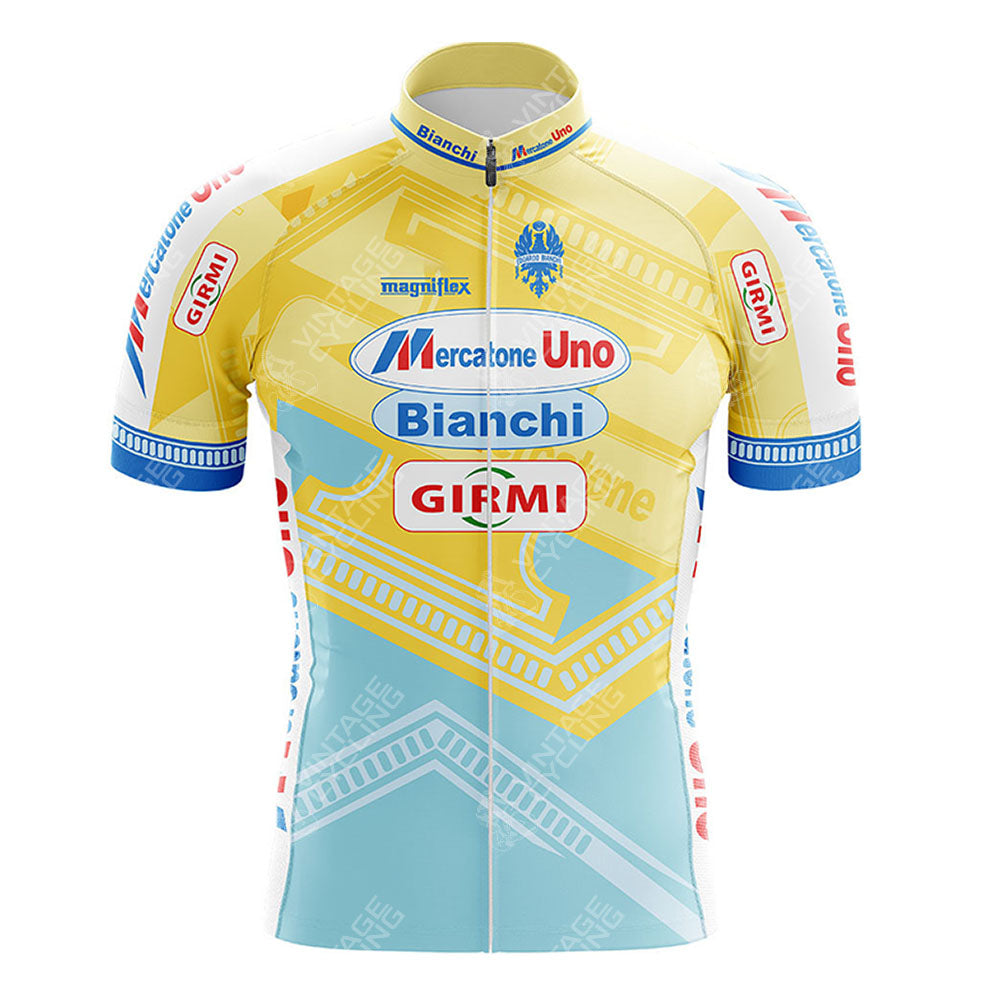 The Credit Agricole Retro Short Sleeve Cycling Set features a vibrant yellow, blue, and white design, highlighted with logos for Mercatone Uno, Bianchi, and Girmi.