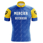 The Mercier Retro Short Sleeve Cycling Set features a blue and yellow cycling jersey with Mercier and Hutchinson on the front, short sleeves with a black and yellow circular BP logo, and a convenient front zipper.