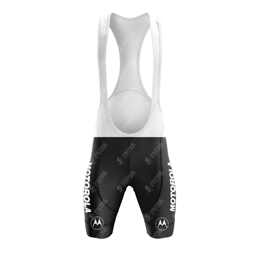 The I'MACYCLING Grandpa Short Sleeve Cycling Set features black and white bib shorts with vertical MOTOROLA prints on the sides, logo details on each thigh, and white mesh straps for a classic retro cycling look.