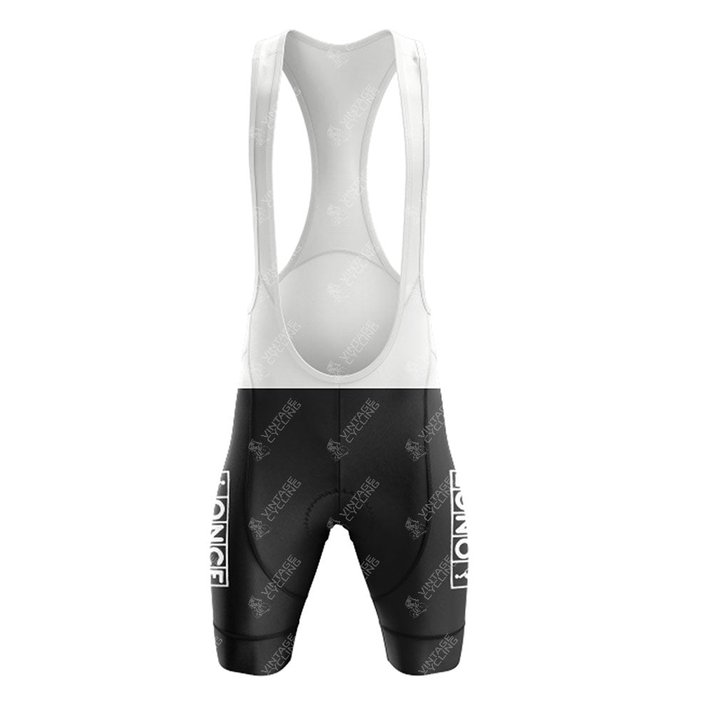 Front view of the ONCE Yellow Retro Short Sleeve Cycling Set: short sleeve jersey and black shorts with "LONGE" in white on both thighs—a stylish choice for your customizable cycling kit.
