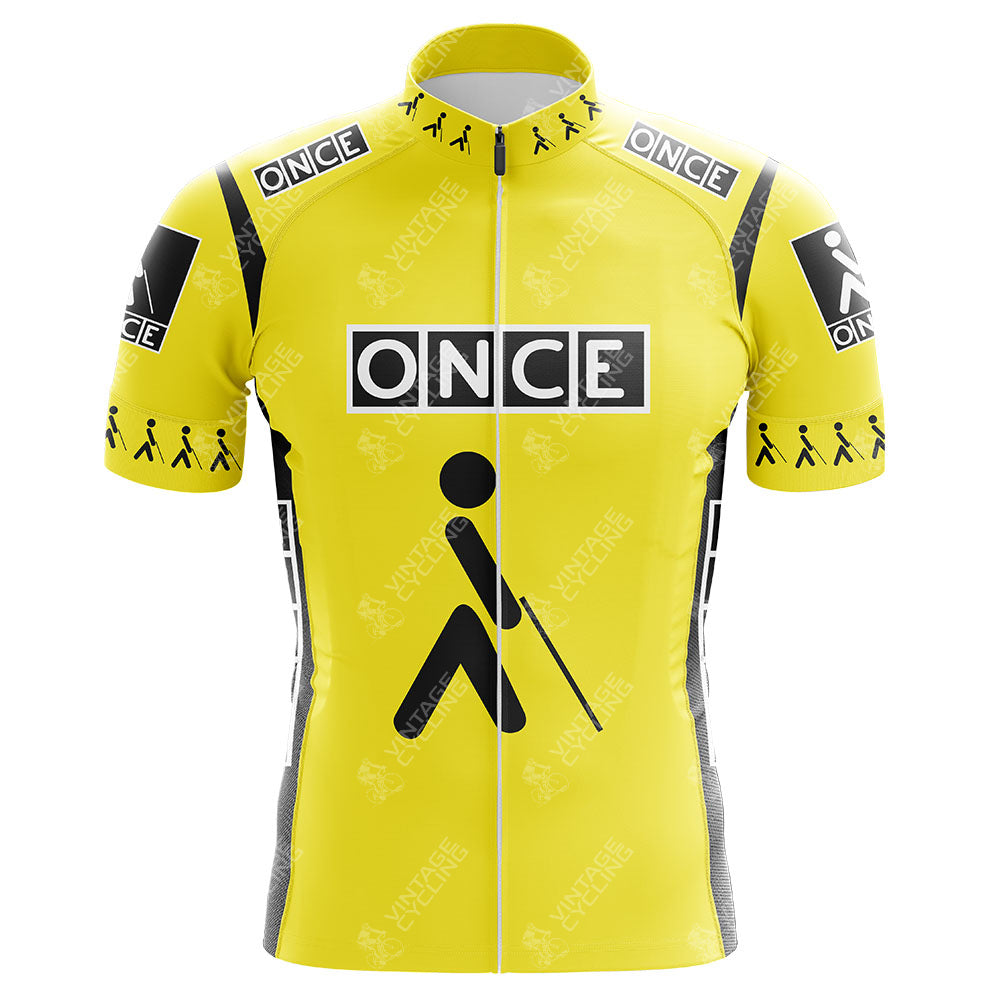 The ONCE Pink Retro Cycling Jersey features a large person-with-cane icon symbolizing visual impairment, with smaller cane icons on the sleeves and sides—a classic nod to retro cycling style.