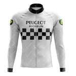 The PEUGEOT Retro Long Sleeve Cycling Set features a white jersey with a black collar, PEUGEOT and MICHELIN logos on the chest above a checkered pattern. Made from lightweight polyester, the sleeves display green and yellow circular BP logos against a plain backdrop.